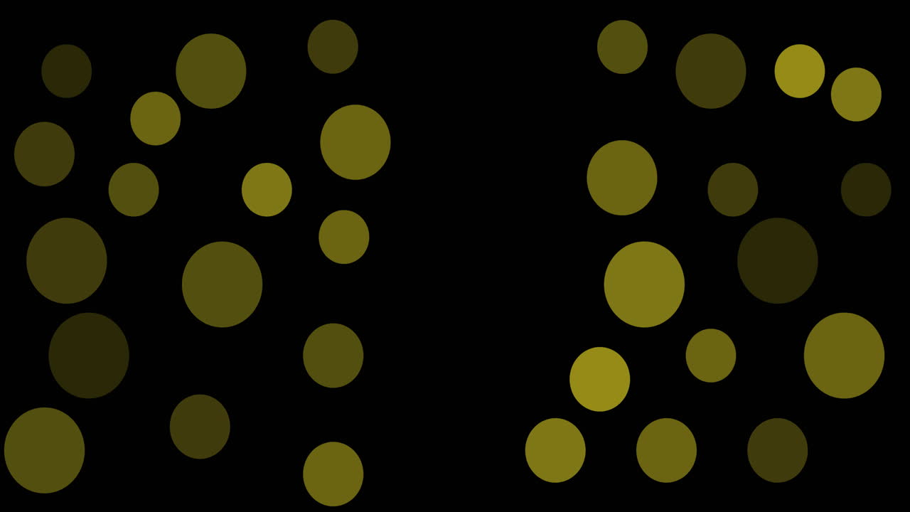 Animation of multiple yellow spots floating on black background