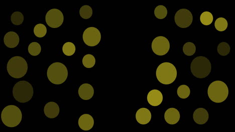 animación de múltiples manchas amarillas flotando sobre un fondo negro