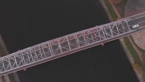 upper view river bridge with traffic autumn forestry banks