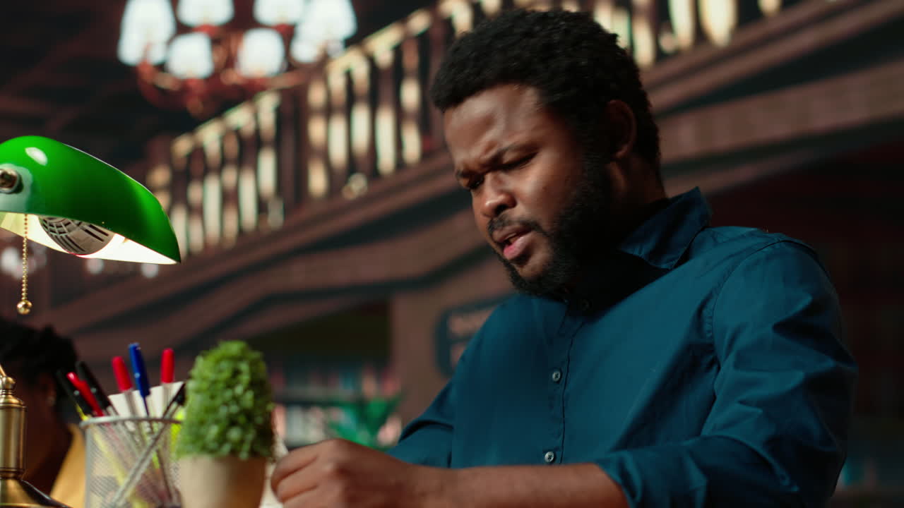 Black university student feeling anxious and struggling with learning