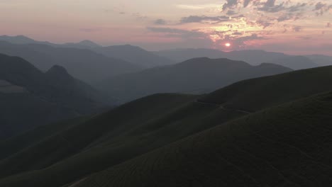 rural mountain road with sunset in background, iraty on atlantic pyrenees, france