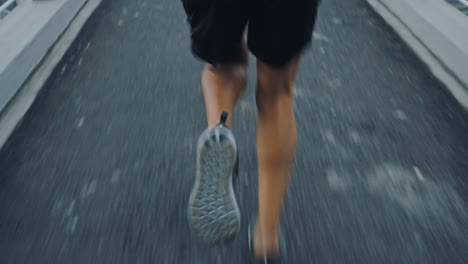 fitness, city and man running on bridge training