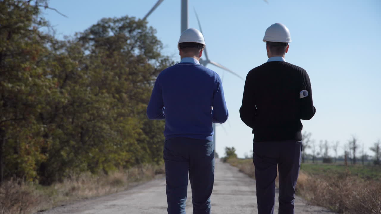 Wind Farm Engineers Inspecting