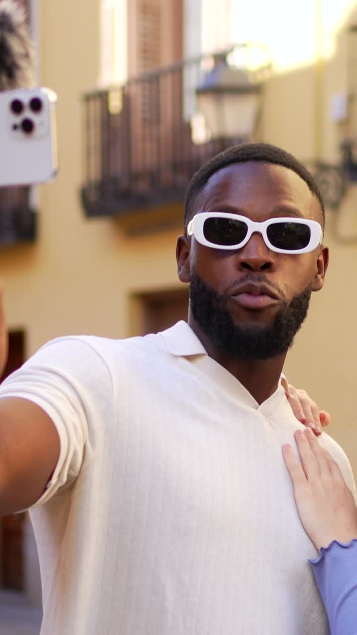 Stylish couple poses for a photo