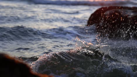 slow motion of waves crashing smoothly on rocks, kvalvika, lofoten, norway