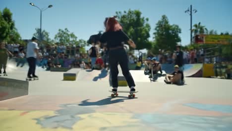 woman skateboarding at a skatepark
