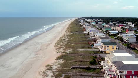 Aerial-over-luxury-vacation-homes-at-kure-beach-nc,-north-carolina