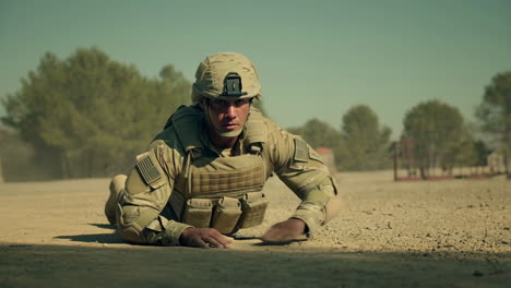 soldier performing desert training exercise