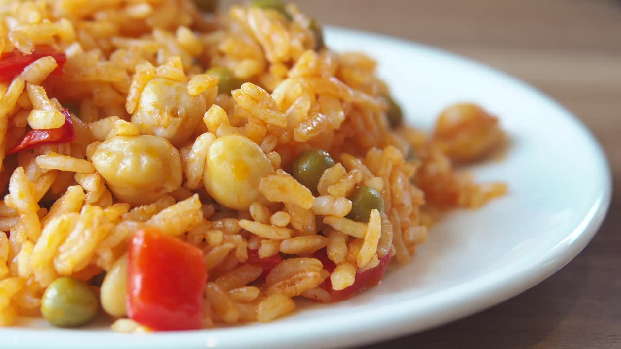 Rice pilaf with peas, beans and red pepper