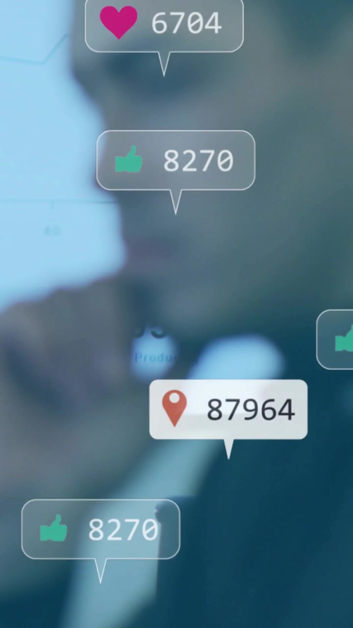Vertical video: Man in suit holding chin as notifications streaming, watching like counts for ads