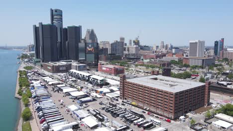 paddock area with race teams and trailers of indycar race event in downtown detroit