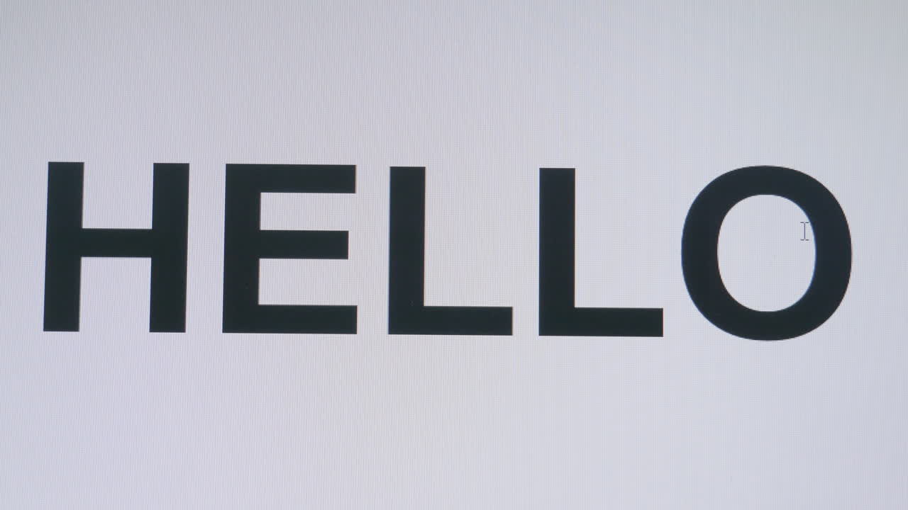 escribir la palabra hola en un teclado revelado en el monitor o enviar un mensaje de texto