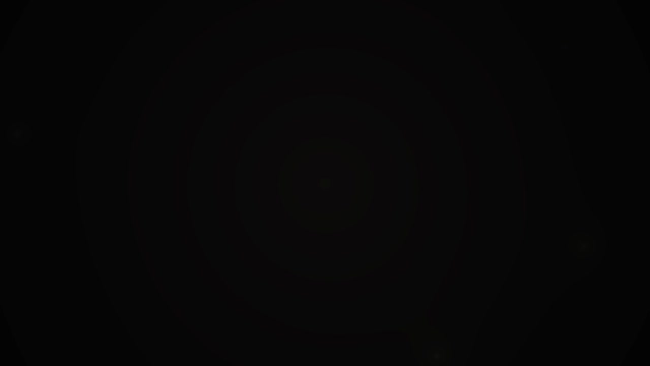 Subtle Light Leaks and Lens Flare Effects on Black Background