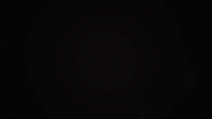 Leggeri effetti di light leak e lens flare su sfondo nero