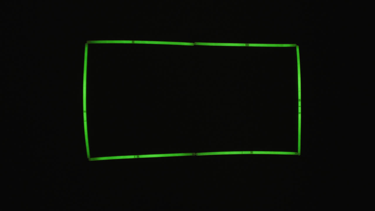 녹색 네온 빛 막대기가 복사 공간과 함께 검은 바탕에 직사각형을 형성하는 애니메이션