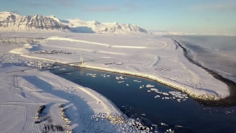 Drone-flies-towards-the-Diamond-Beach-Iceland-in-a-beautiful-panorama