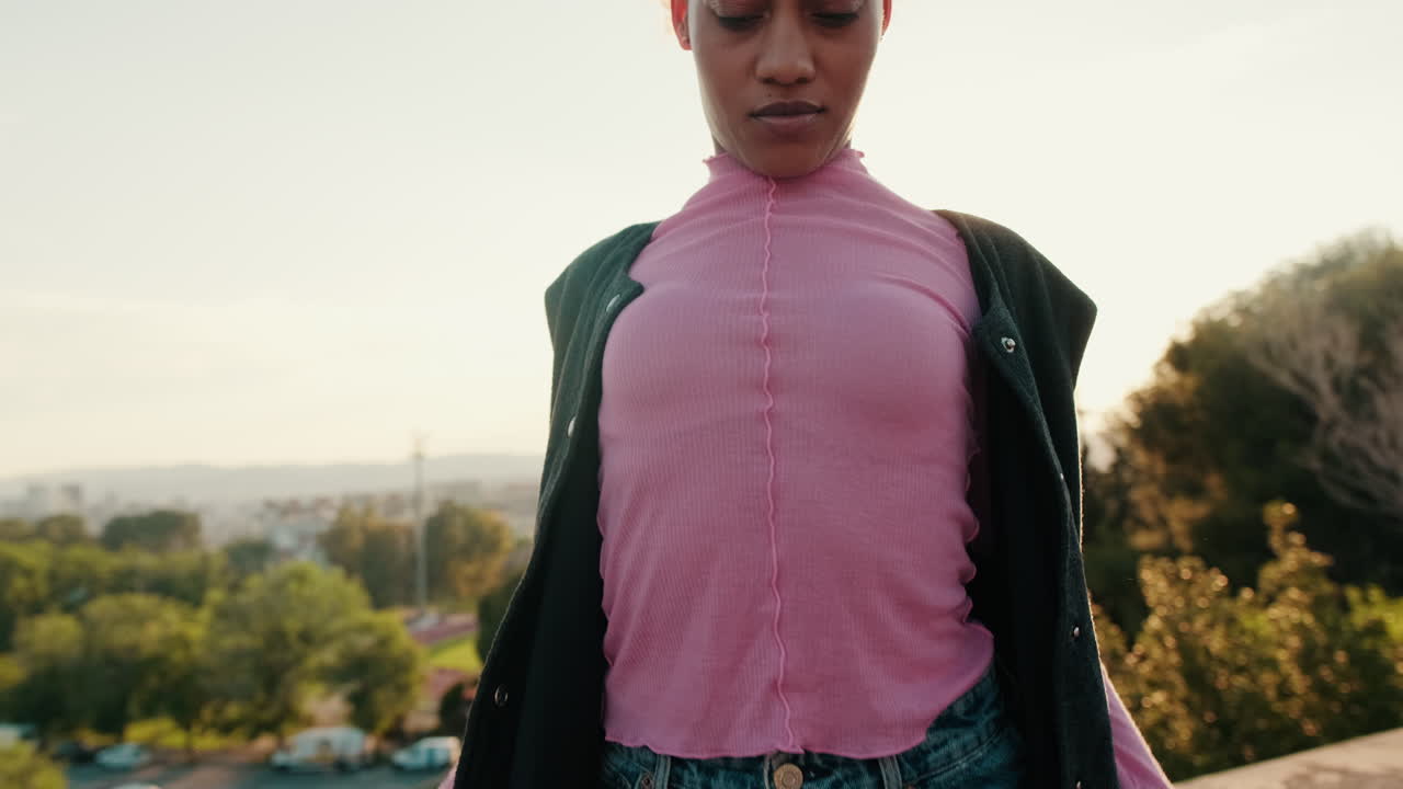 Young Woman Dances in Golden Hour Light