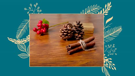 Animation-of-cinnamon,-pine-cones-and-present-in-blue-frame-with-plants