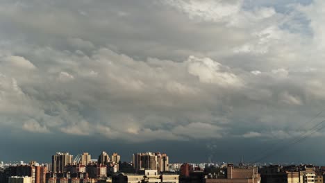 clouds over the modern city, a large-scale view, a grandiose sky, a storm approaching the city