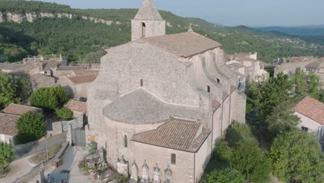 aerial drone luberon provence saignon france medieval town church at sunrise