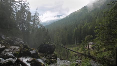 timelapse on waterfall of vallesinella and landscape, madonna di campiglio, trentino alto adige, italy