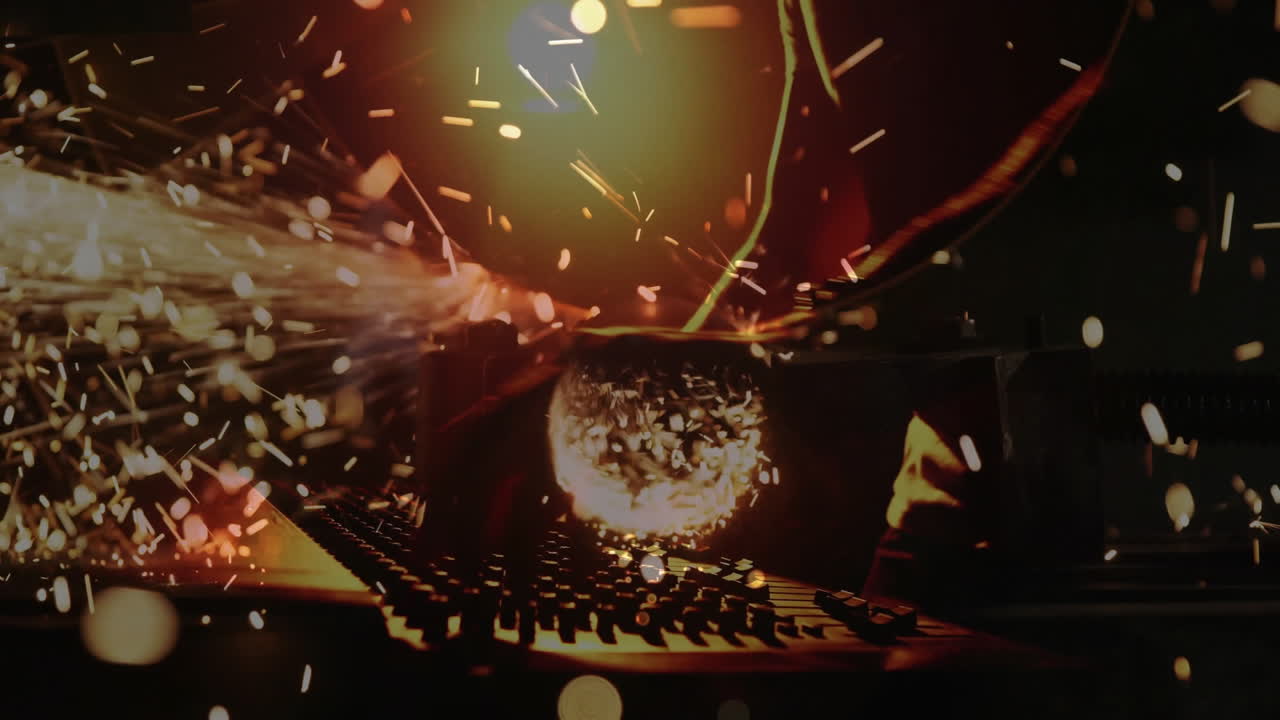 Metalworker's arm using angle grinder in metal shop, with animated sparks over molten sphere