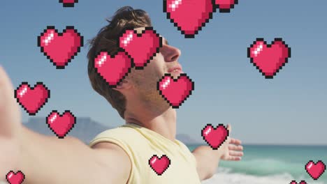 animation of heart icons over man with eyes closed and arms stretched on beach