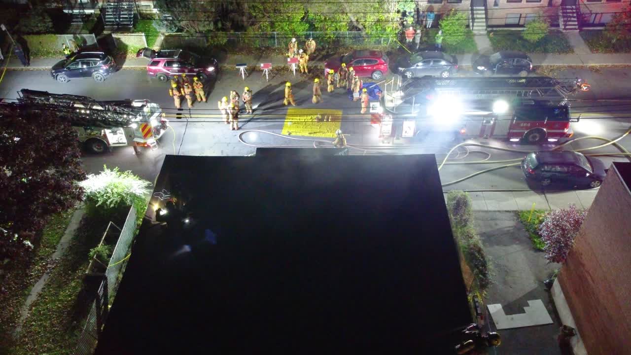 Loads of Fire Fighters Outside Brick House After Putting Out Inferno