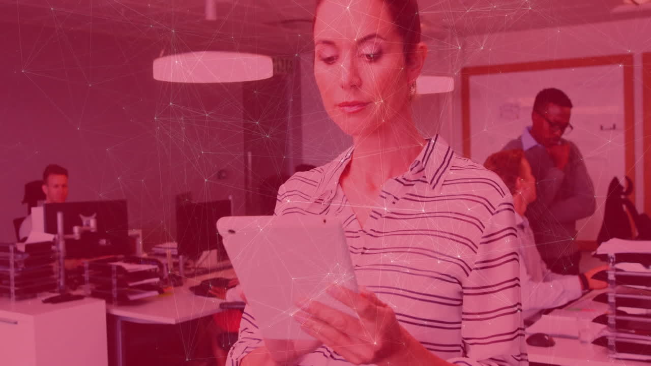 Woman holding tablet analyzing business data in modern office, with floating animated charts