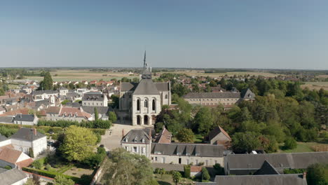 aerial drone point of view of the abbaye de fleury in the loire valley, saint benoit sur loire, france