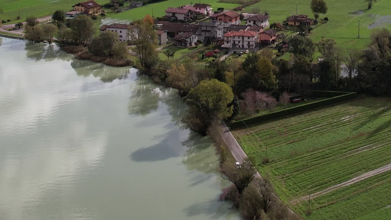 Stunning aerial view of a tranquil lake in the Italian Alps region