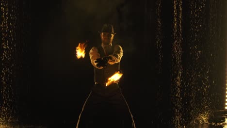 fire juggler performance with water effect