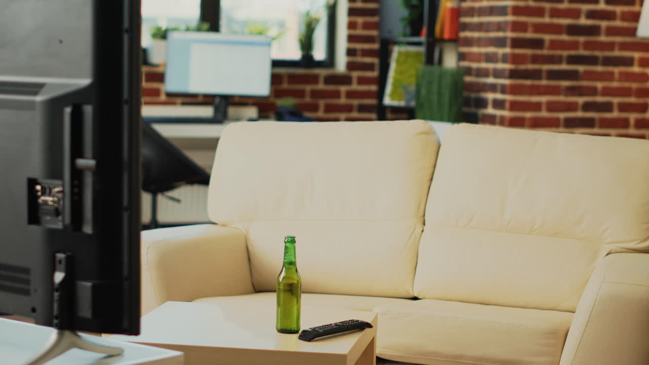 Cheerful man and woman eating slices of pizza at home
