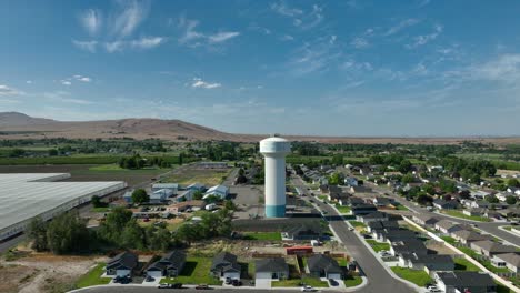 Drone-shot-pulling-away-from-Benton-City's-water-tower-and-surrounding-neighborhood