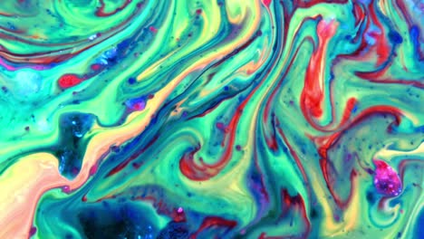 colores abstractos extendiendo pintura girando y estallando