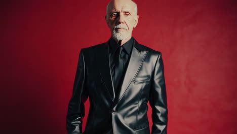 older man in a black leather jacket portrait