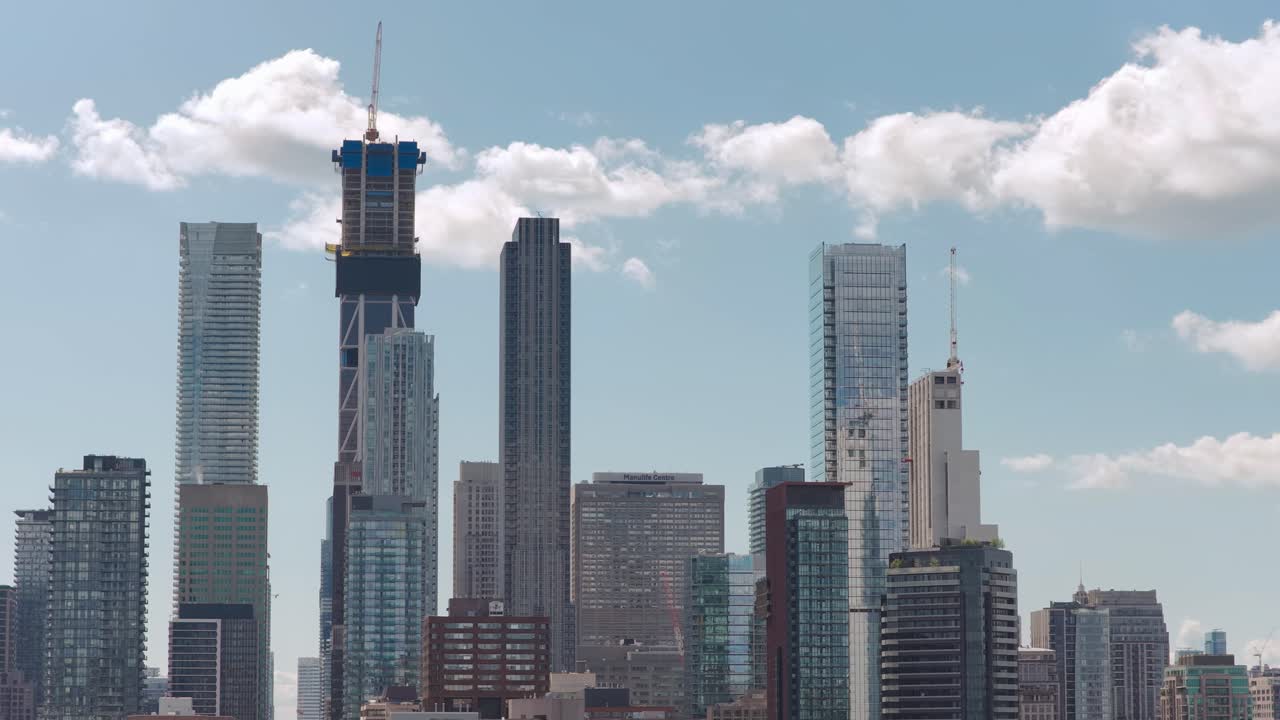 Drone pan shot of the Skyline of downtown Toronto near Bay and Bloor street