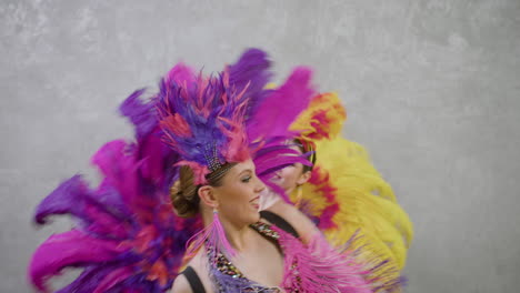 three beautiful showgirls dancing 3