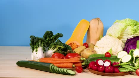 assorted vegetables arranged on a white background