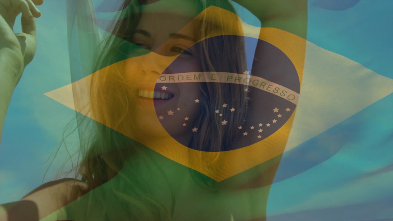 Flag waving sparking fade into model lifting arms fixing hair smiling draping cover showing pride