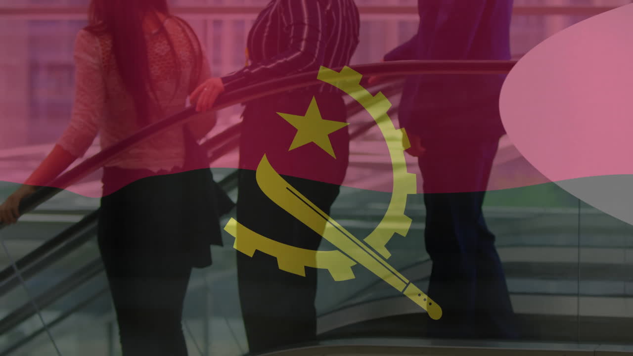 Angola flag overlaying animation of people standing on escalator in building