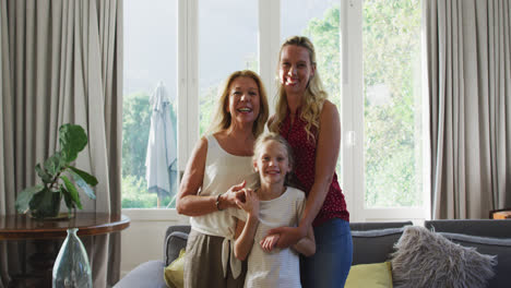 caucasian woman spending time with her mother and her daughter