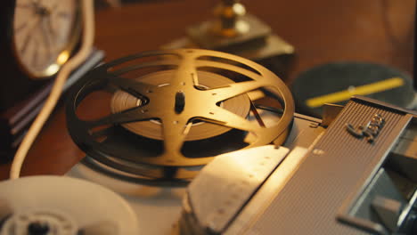 reel to reel tape spinning on desk