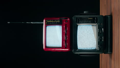 Two retro portable televisions