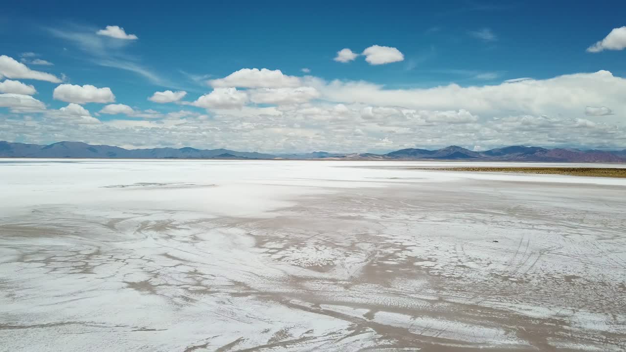Breathtaking Landscape Aerial. Majestic Salt Flat Under Blue Sky and Clouds. Salinas Grandes, Salta, Argentina