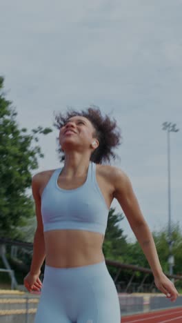 woman running on track