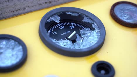 Static-close-up-shot-of-broken-water-gauge-on-yellow-tank