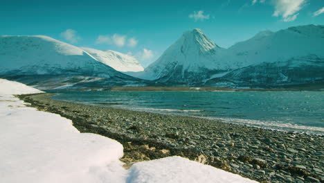 Stunning-cinematic-tracking-shot-right-to-Left-of-a-fjord-and-mountains-in-Norway