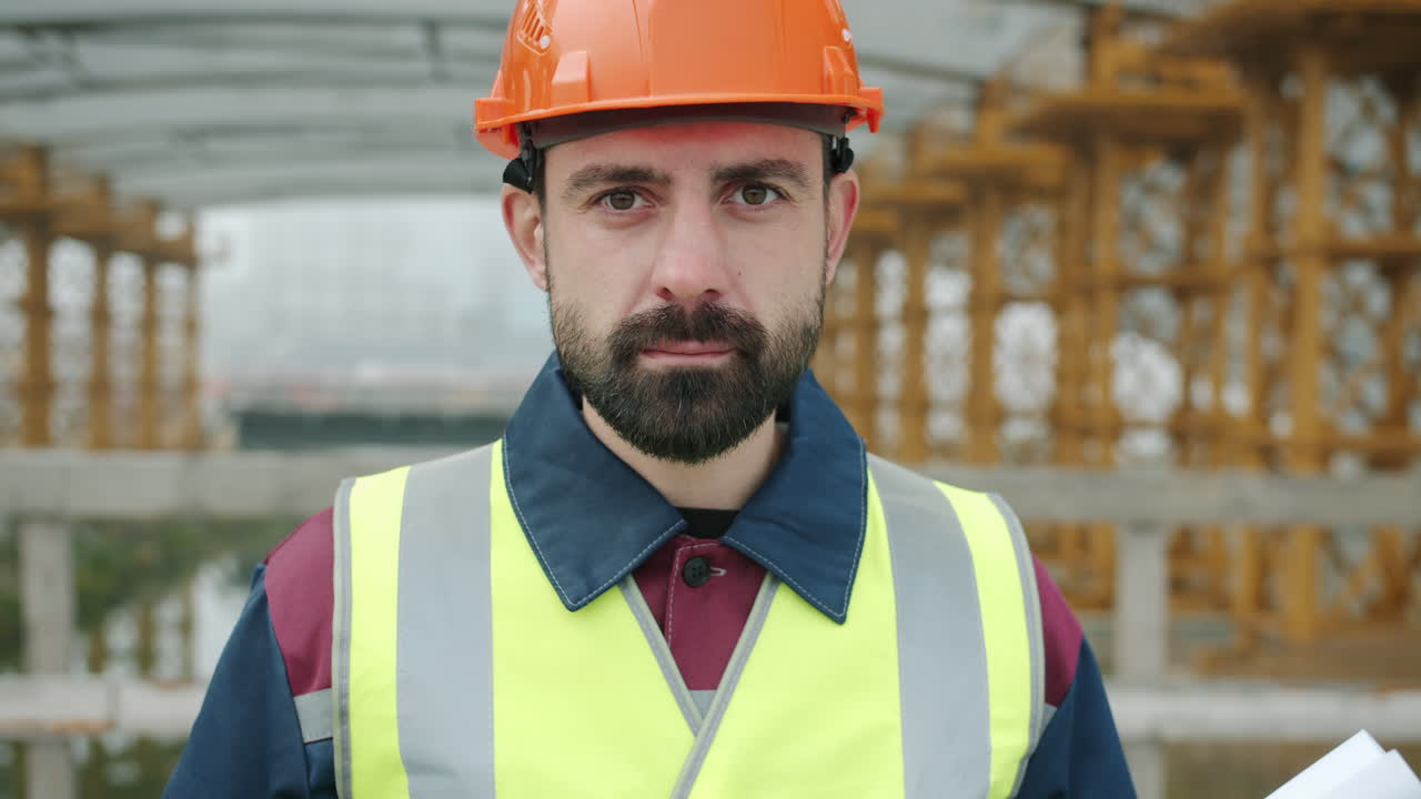 Construction worker portrait at a bridge construction site