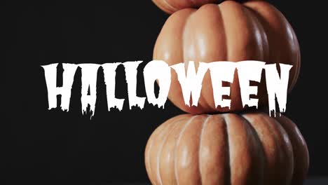 animation of white halloween text over pumpkins on black background